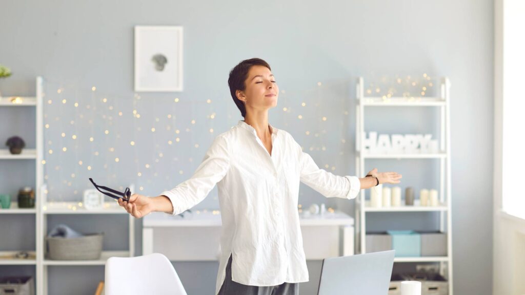 Happy woman enjoying her peace of mind after a pest control service after following our guide of getting rid of german cockroach infestation