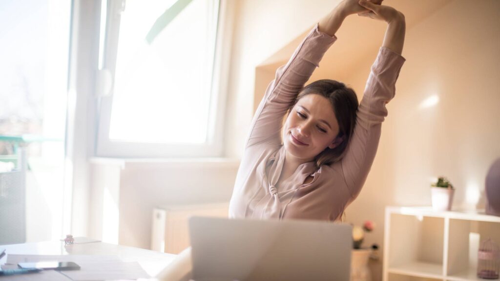 woman enjoying her flea free home after effective flea removal from home