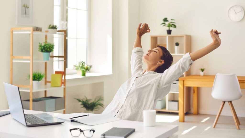 woman happy because she has a flies free house after a pest control service on her home