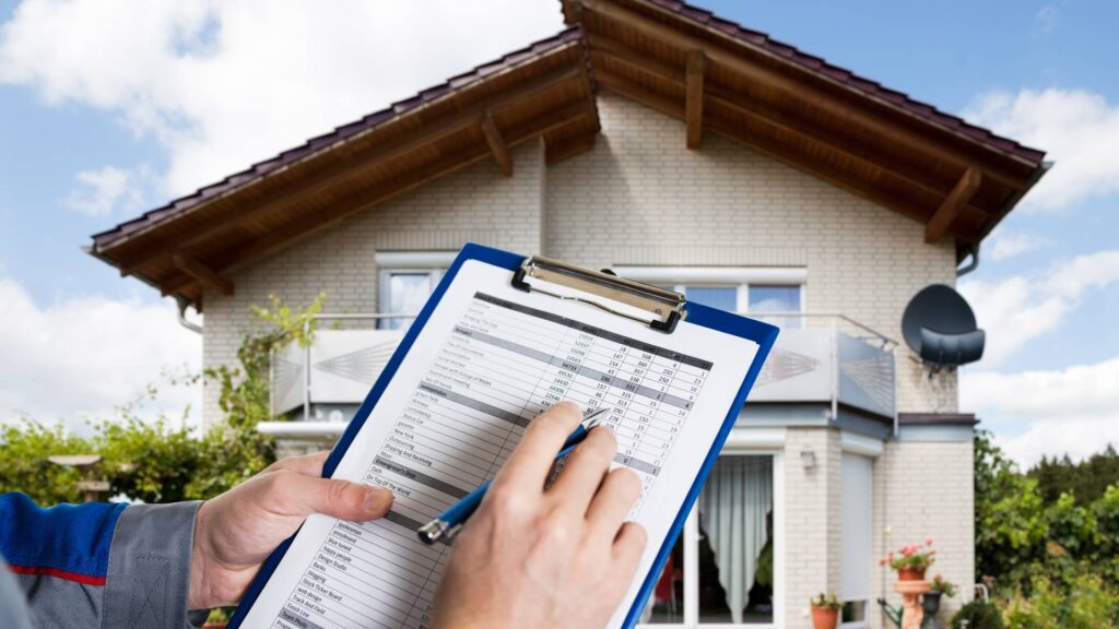 inspection table in front of a house to illustrate the importance of pest and termite inspection before buying a home